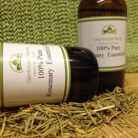 bottle of rosemary essential oil