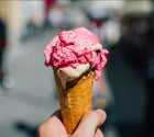 picture of ice cream cone with vanilla nd cherry ice cream. pix