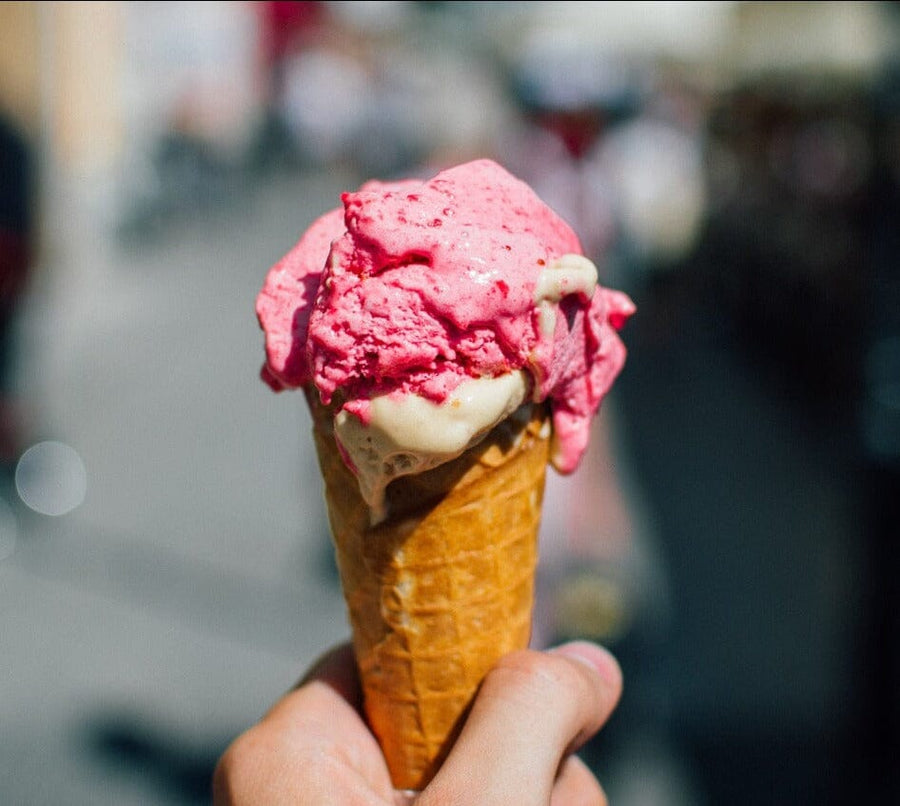 picture of ice cream cone with vanilla nd cherry ice cream. pix