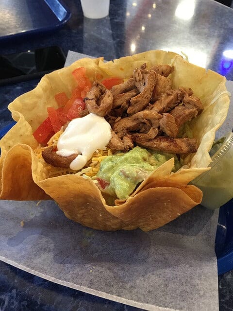 Pic  of a taco salad in a taco shelll