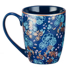 back of coffee mug with dark blue color and flowers with Psalm20:4