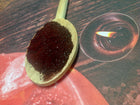 Dragon's blood powder of a dark red  color