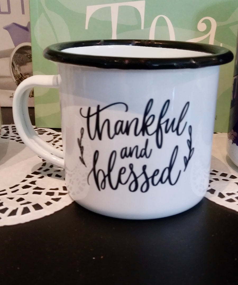 White and Black campfire style  mug that says Thankful and blessed