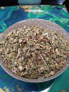Echinacea ang herb cut for tea in a bowl