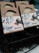 jasmine soap packaged in a brown box with chinese painting of bird and jasmine