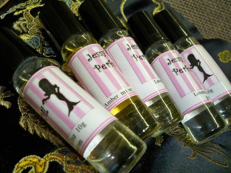 glass roll on bottles of perfume