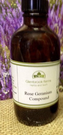 bottle of rose geranium compound